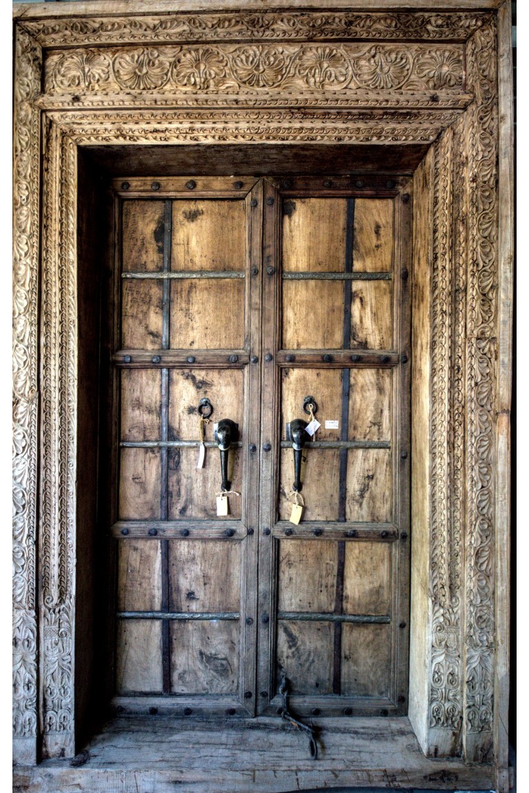 Monumental door in carved wood